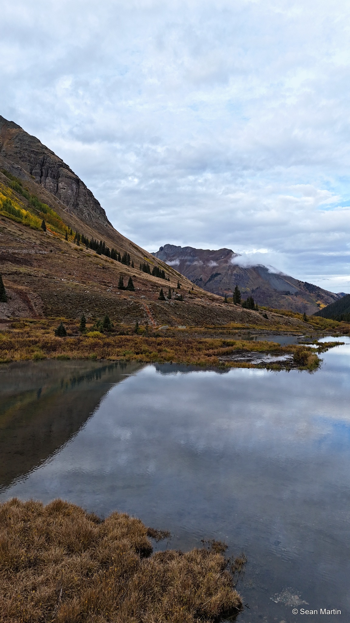Mountains reflected in a still pool